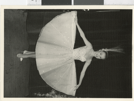 Photograph of a performer wearing a mid-length gown, Dunes Hotel, Las Vegas (Nev.), 1957-1960s