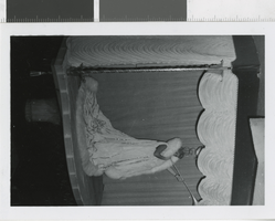 Photograph of showgirl in a long dress, Las Vegas (Nev.), 1957-1960s