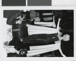 Photograph of a showgirl in black dress, Las Vegas (Nev.), 1957-1960s