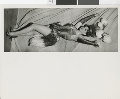 Photograph of showgirl in feathered costume, Las Vegas (Nev.), 1957-1960s