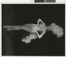 Photograph of showgirl in feathered costume, Las Vegas (Nev.), 1957-1960s