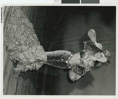 Photograph of a showgirl in mermaid dress, Las Vegas (Nev.), 1957-1960s