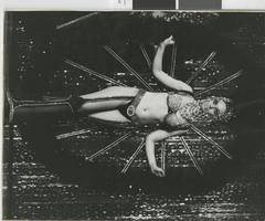 Photograph of a showgirl in a jeweled costume, Las Vegas (Nev.), 1957-1960s