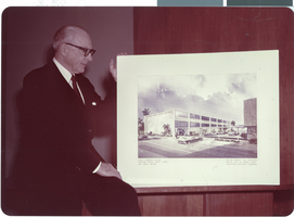 Photograph of Cyril Wengert and artist's rendering of Southern Nevada Power Co. offices, February 1961