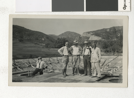 Photograph of C. D. Baker and others at a construction site, early 1930s