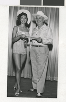 Photograph of C. D. Baker with Miss Nevada, 1960-1972