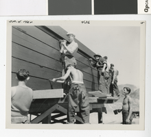 Photograph of men working on a scow, Lake Mead, 1935-1940