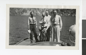 Photograph of men in a boat, Lake Mead, April 20, 1938
