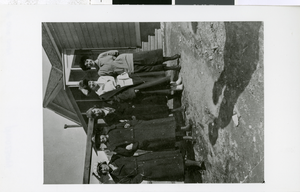 Photograph of women posing outside house, Pioche (Nev.), 1875-1893