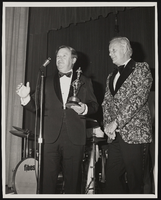 Black-and-white photograph of Donn Arden accepting an award, Las Vegas (Nev.), mid 1970s