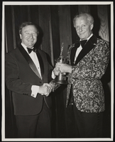 Black-and-white photograph of Donn Arden accepting an award, Las Vegas (Nev.), mid 1970s