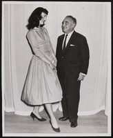 Photograph of Frank Sennes and a showgirl at the Stardust Hotel and Casino, Las Vegas (Nev.), 1958