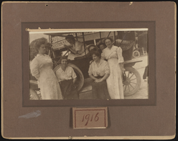 Photograph of women and children in and around automobile, Goodsprings (Nev.), 1916