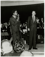 Photograph of Sammy Davis, Jr. and Frank Sinatra entertaining  in the Copa Room, Las Vegas, early 1960s