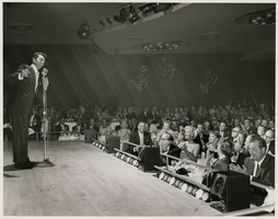 Photograph of Dean Martin and celebrity audience, Sands Hotel Copa Room, Las Vegas, March 6, 1957