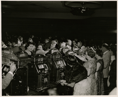 Photograph of slots players at the Sands Hotel and Casino, Las Vegas, circa late 1950s-early 1960s