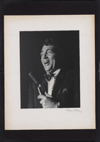 Photograph of Dean Martin performing with a microphone, Las Vegas, 1960