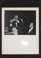 Photograph of Frank Sinatra and Dean Martin with a trombone in the Sands Copa Room, Las Vegas, 1960