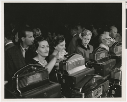 Photograph of people playing slot machines, Sands Hotel and Casino, Las Vegas, circa late 1950s-early 1960s
