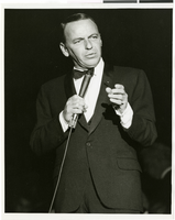 Photograph of Frank Sinatra singing in the Copa Room at the Sands Hotel, Las Vegas, April 1966
