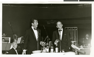 Photograph of Dean Martin and Frank Sinatra performing at the Sands Hotel, Las Vegas, January 22, 1964