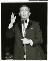 Photograph of Joey Bishop performing at the Sands Hotel, Las Vegas, April 1966