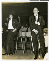 Photograph of Dean Martin and Frank Sinatra performing at the Copa Room in the Sands Hotel, Las Vegas, 1962