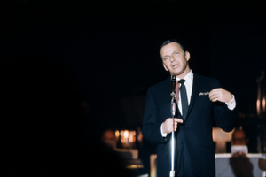 Slide transparency of Frank Sinatra performing at the Sands Hotel, Las Vegas, February 1963