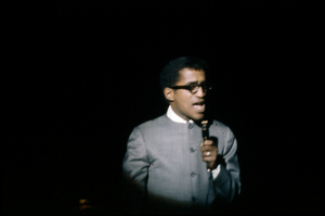 Slide transparency of Sammy Davis, Jr. singing in the Copa Room at the Sands Hotel, Las Vegas, February 1963