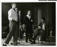 Photograph of Jerry Lewis and Dean Martin recording a radio program, Las Vegas, circa 1950s