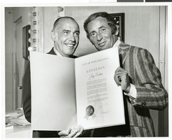 Photograph of Joey Bishop receiving a citation from the City of Philadelphia, August 1970