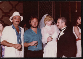 Jerry Jackson with Helen Edwards at wedding: candid photograph