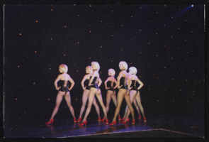 Dancers on stage in costume