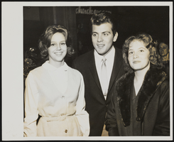Fabian with two women: photograph
