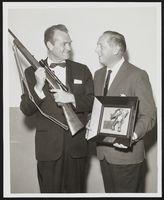 Red Skelton receiving award from Mount Kenya Safari Club: black-and-white photographs