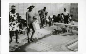 Photograph of Carver House Hotel and Casino diving board, featuring unidentified patrons