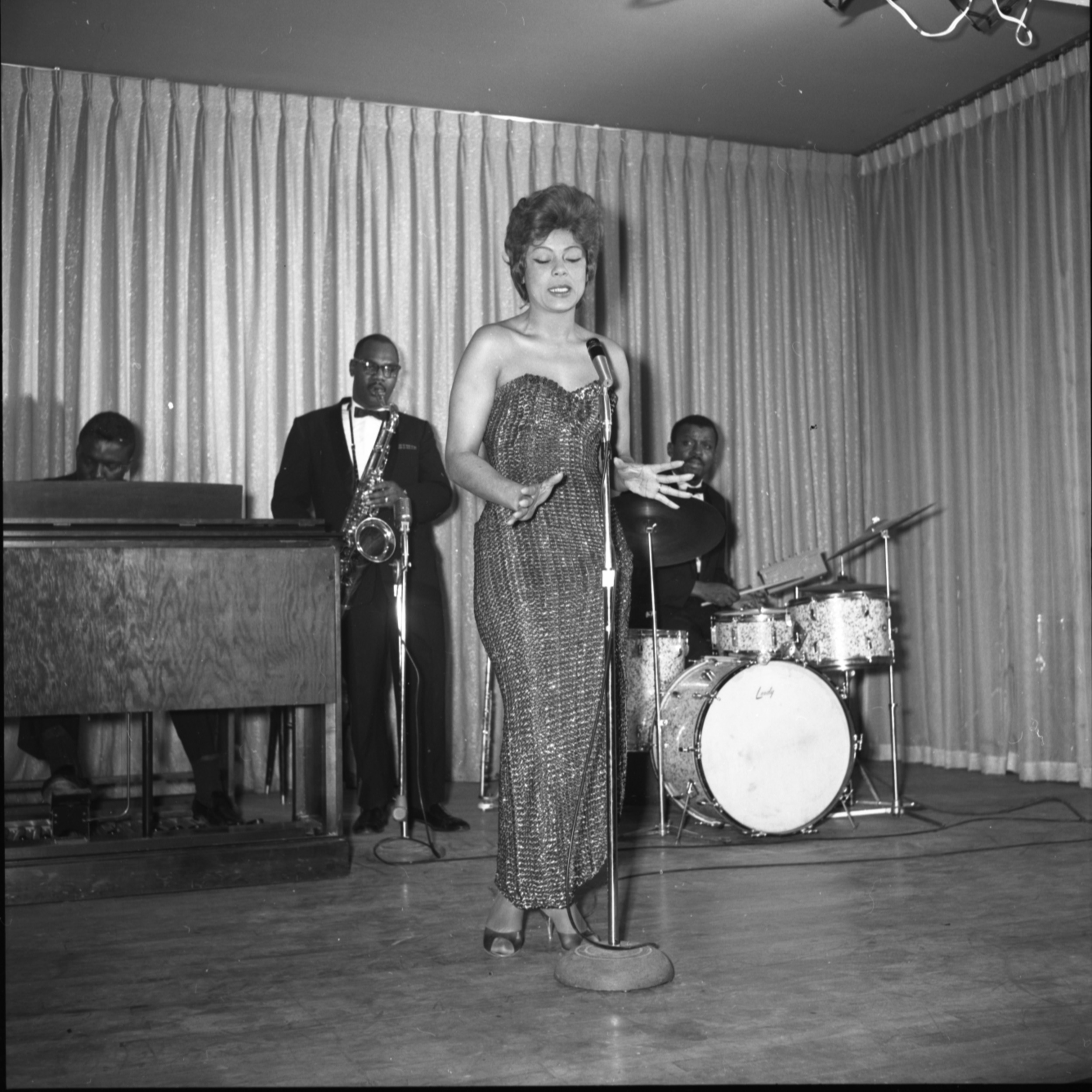 Film negative of a Carver House talent show, January 24, 1962