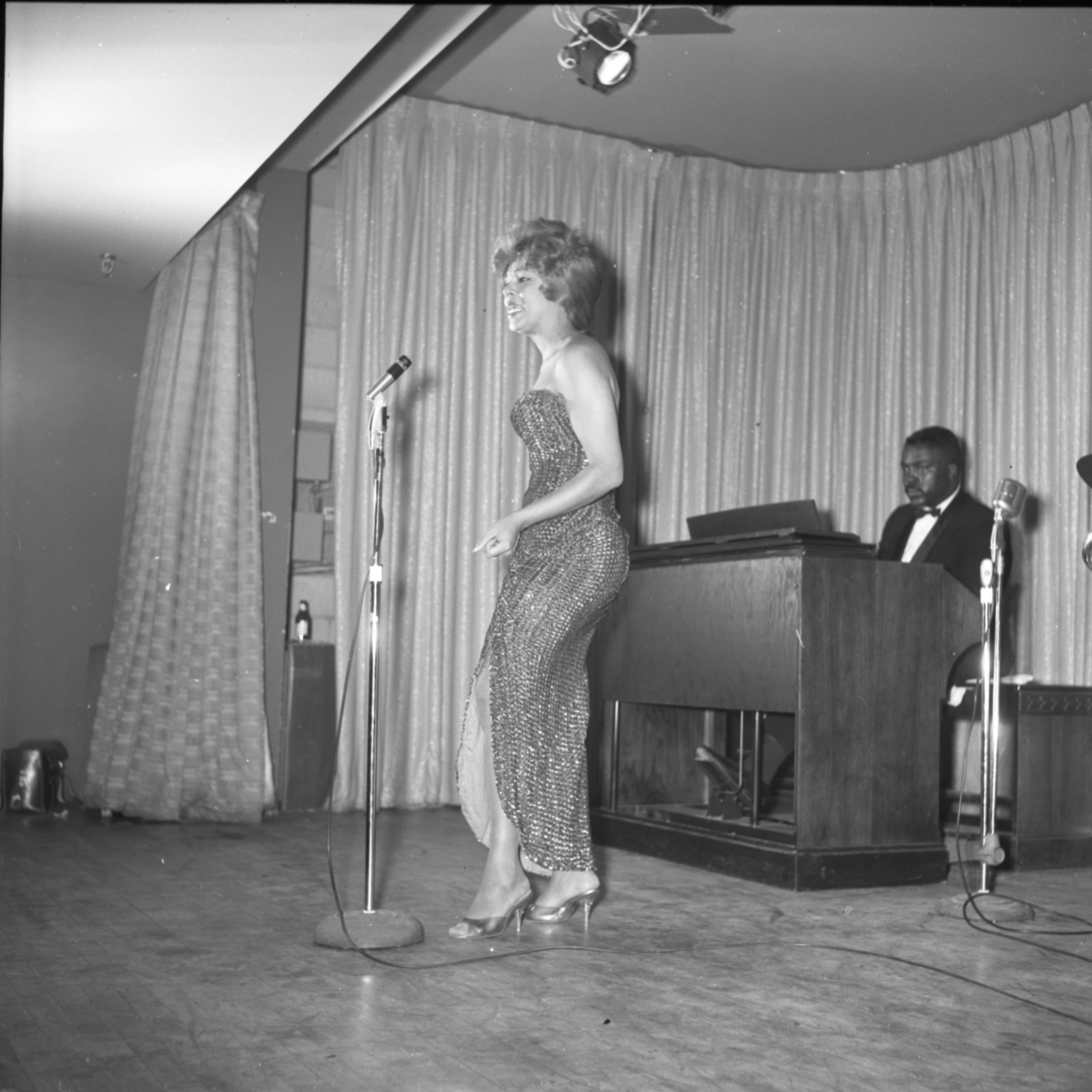 Film negative of a Carver House talent show, January 24, 1962