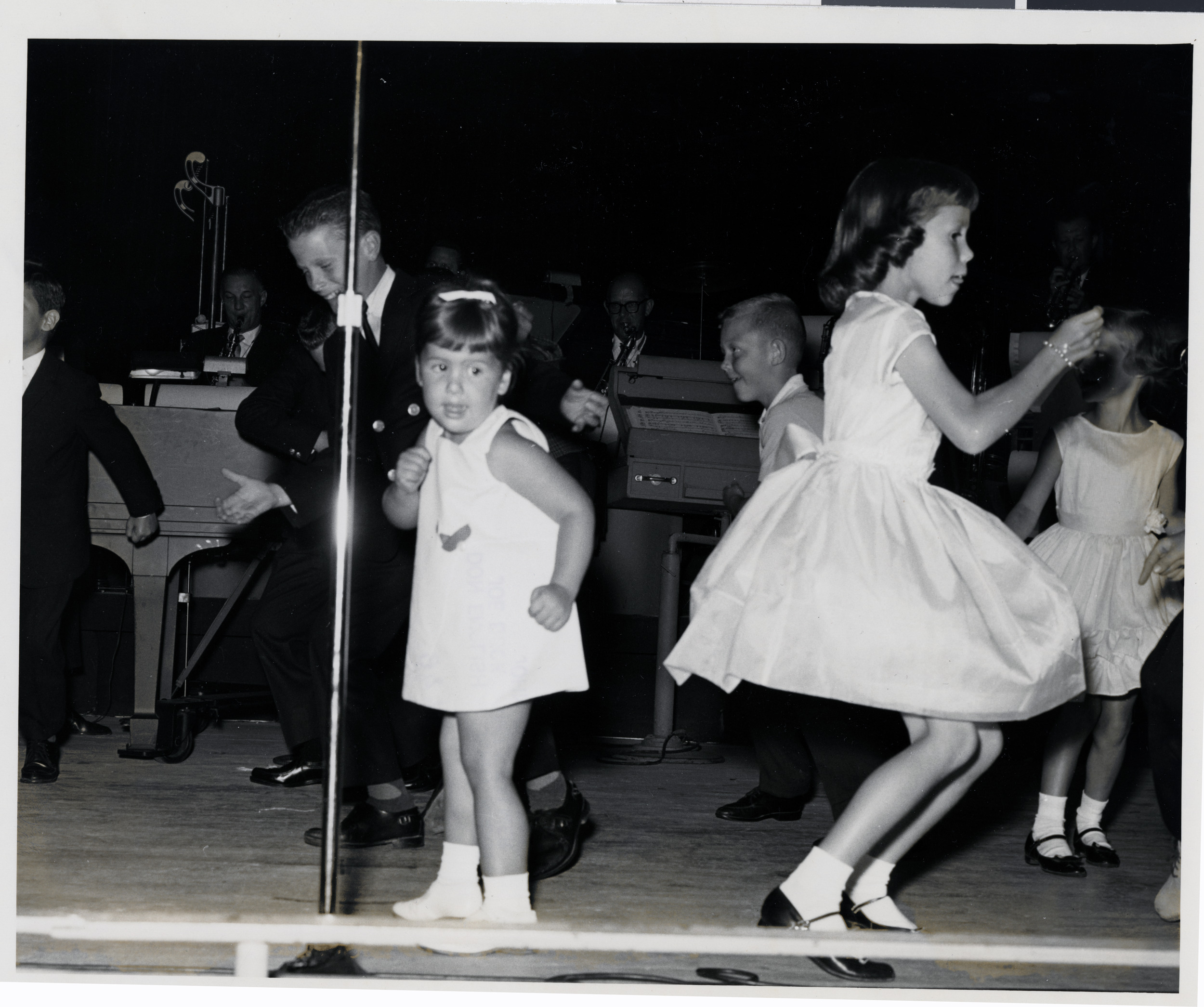 Photograph of Chubby Checker performing onstage at the Sands Hotel, August 1962