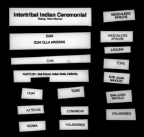 "Intertribal Indian Ceremonial, Gallup, New Mexico; Zuni, Zuni Olla Maidens; Zuni; Hopi; Toas; Aztecas; Kiowa; Toas; Comanchi; Voladores; Mescalero Apache; Mescalero Apache; Laguna; Toas; San Juan Navajo; San Juan Navajo; Voladores; Photo by - Bob Paluzzi, Indian Wells, California" textual overlay: photographic negative