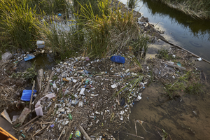 Garbage along the Las Vegas Wash at the Clark County Wetlands Park, Clark County, Nevada: digital photograph