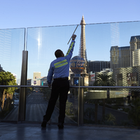 Window washers on a Las Vegas Strip pedestrian walkway, Las Vegas, Nevada: digital photograph