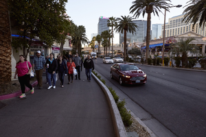 Automobile and pedestrian traffic along the Las Vegas Strip, Las Vegas, Nevada: digital photograph