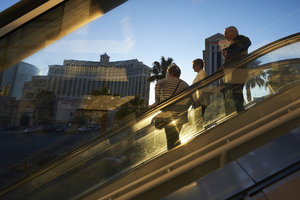 Tourists using overpass on the Las Vegas Strip, Las Vegas, Nevada: digital photograph