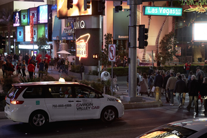 Pedestrian and automobile traffic on the Las Vegas Strip, Las Vegas, Nevada: digital photograph
