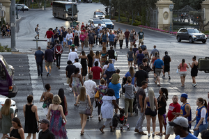 Pedestrians crossing Las Vegas Boulevard at Bellagio Drive, Las Vegas, Nevada: digital photograph