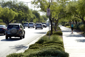 Jogger using sidewalks along West Sahara Avenue, Las Vegas, Nevada: digital photograph