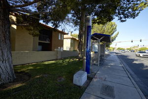 Bus stop on West Sahara Avenue looking east, Las Vegas, Nevada: digital photograph