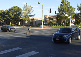 Pedestrian crossing West Sahara Avenue near South Grand Canyon Drive, Las Vegas, Nevada: digital photograph