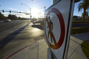 No pedestrian traffic sign on West Sahara Avenue at South Sahara Center, Las Vegas, Nevada: digital photograph